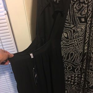 Black sheer dress with shorts romper underneath.